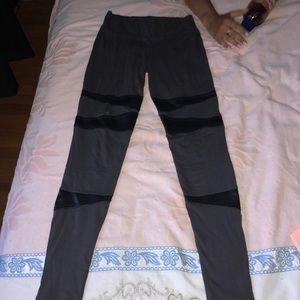 Grey leggings with faux leather inserts